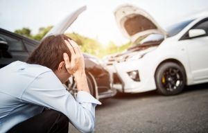Person looking frustrated after a car accident